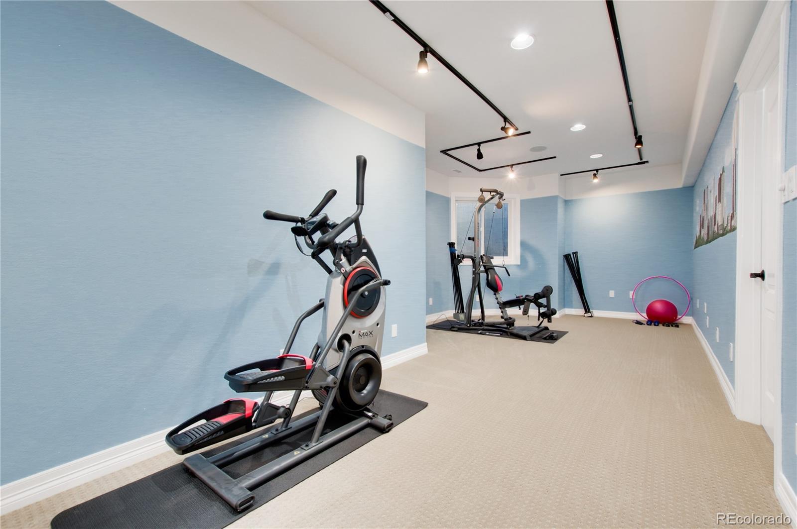71 North Ranch Road Littleton, CO 80127 - Photo 37 of 40 a view of a room with gym equipment
