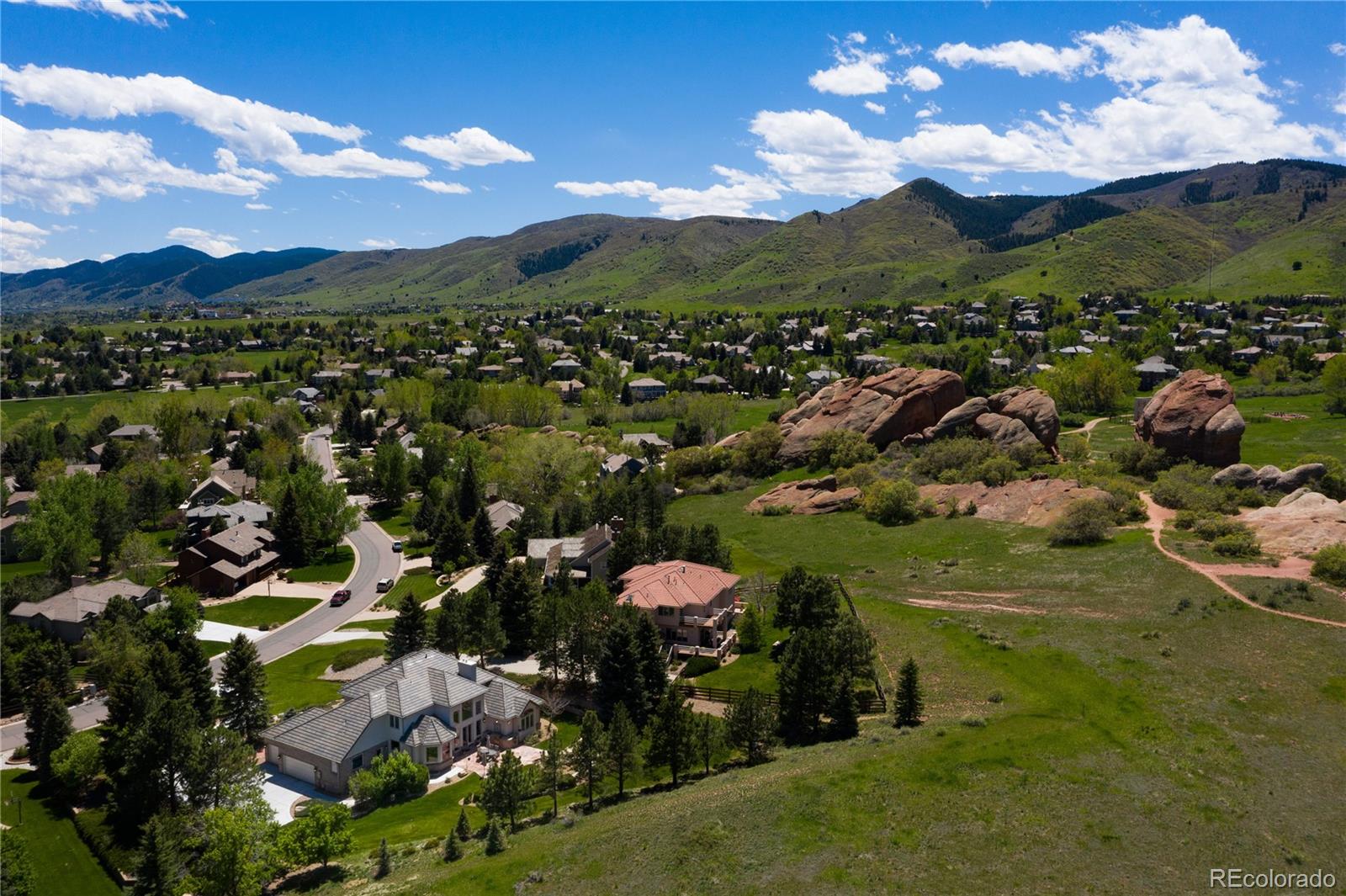 71 North Ranch Road Littleton, CO 80127 - Photo 39 of 40 a view of a lake with a mountain