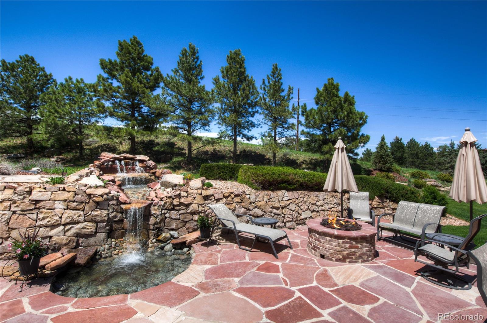 71 North Ranch Road Littleton, CO 80127 - Photo 5 of 40 a view of a yard with furniture