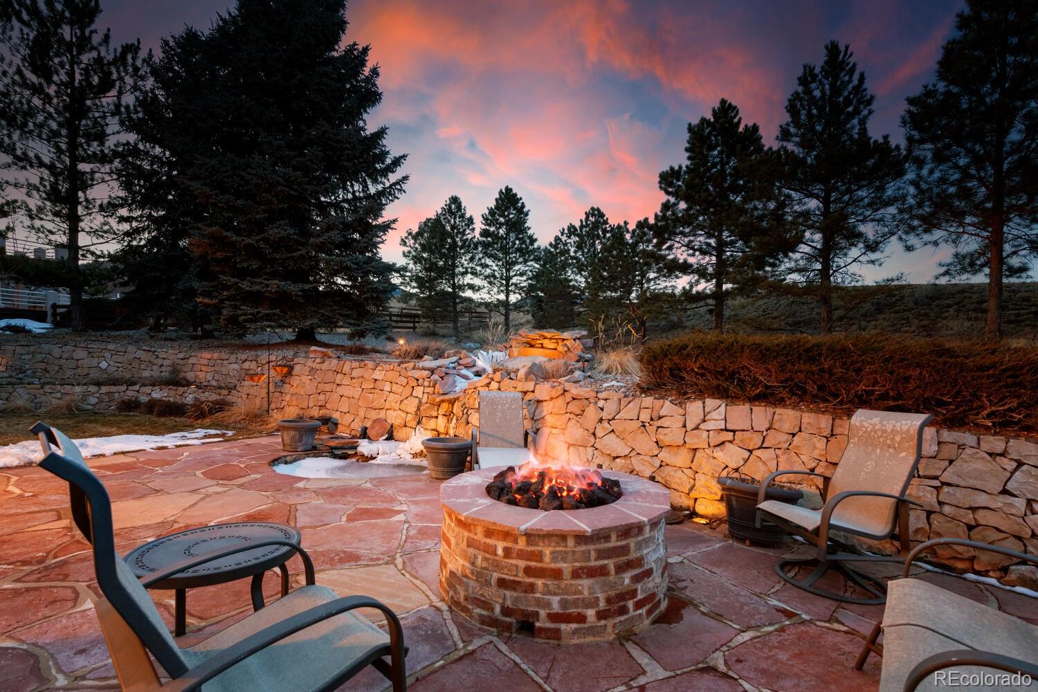 71 North Ranch Road Littleton, CO 80127 - Photo 6 of 40 a outdoor space with patio fireplace