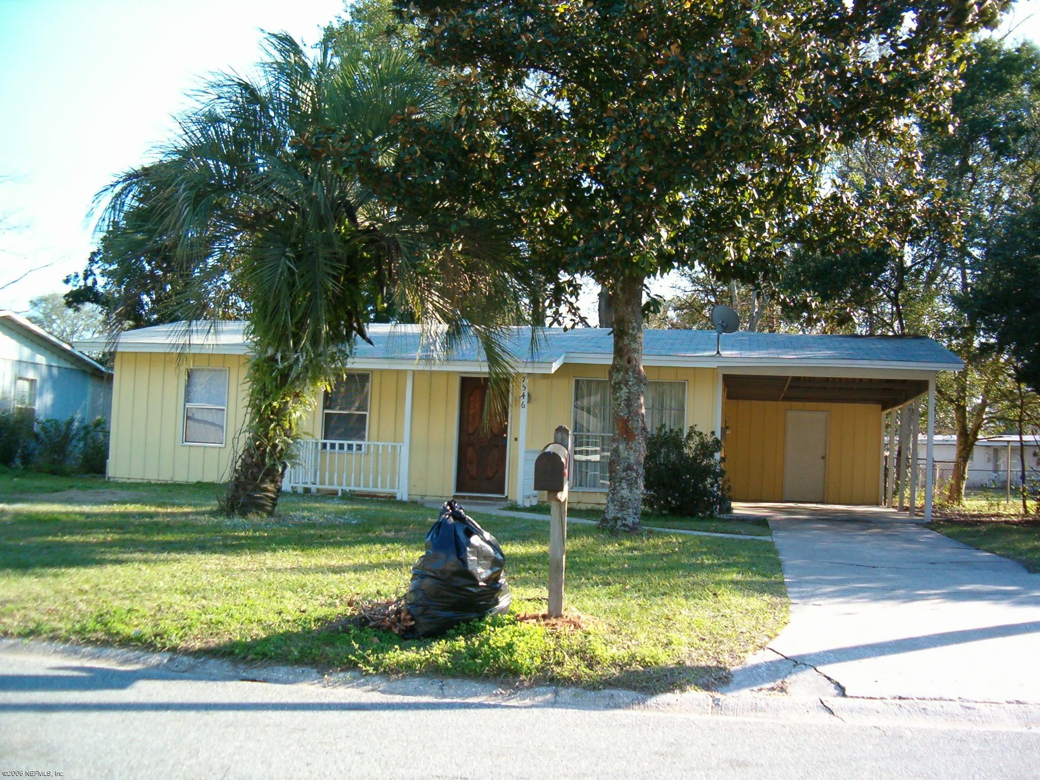 7546 Ridgeway Road North Jacksonville, FL 32244 - Photo 1 of 1 a view of a house with a yard