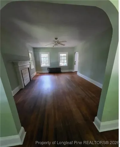 a view of a livingroom with wooden floor
