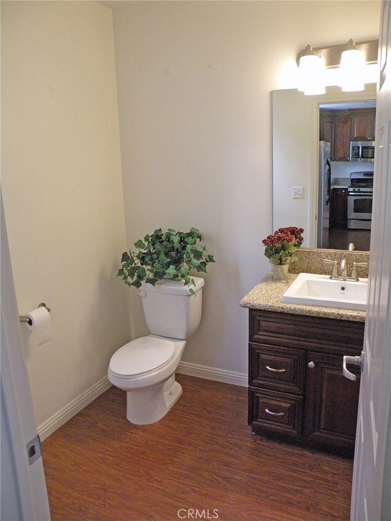 920 Central Avenue Riverside, CA 92507 - Photo 21 of 64 a bathroom with a sink toilet and a mirror