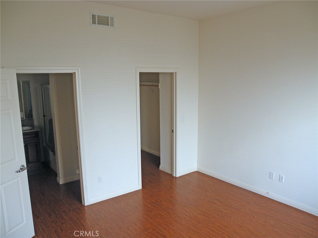920 Central Avenue Riverside, CA 92507 - Photo 27 of 64 an empty room with wooden floor and closet