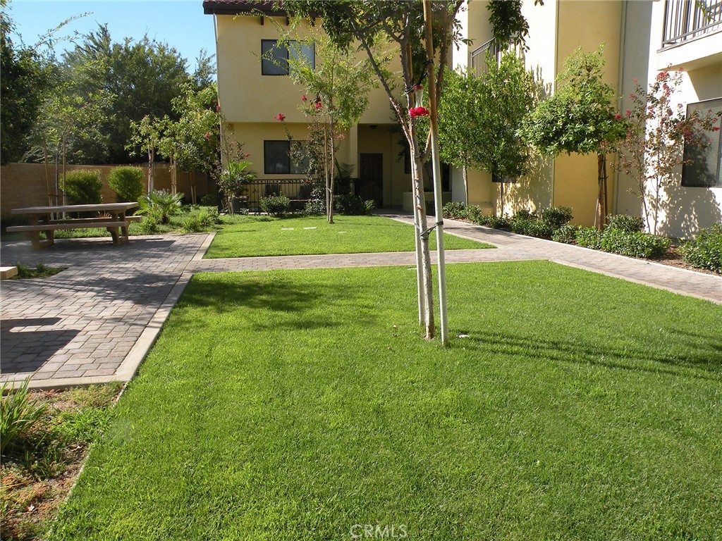 920 Central Avenue Riverside, CA 92507 - Photo 61 of 64 a house view with a sitting space and garden