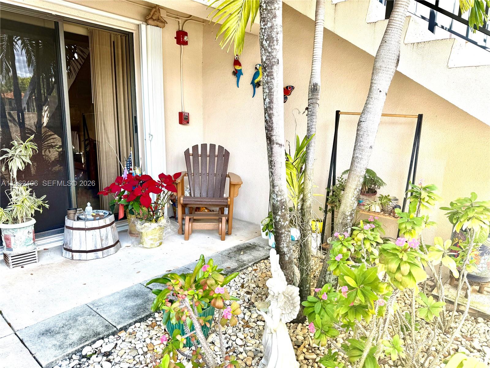 351 Club Circle, Unit 102 Boca Raton, FL 33487 - Photo 4 of 34 a view of balcony and patio