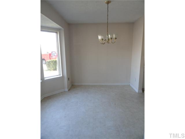 5101 Ranada Court Raleigh, NC 27616 - Photo 2 of 10 a view of empty room with window