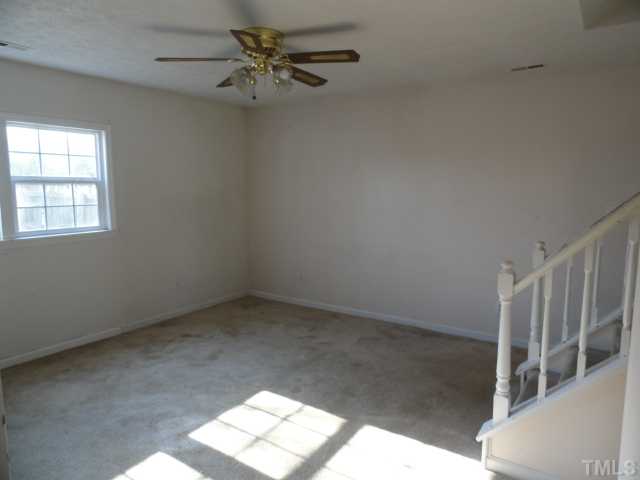 5101 Ranada Court Raleigh, NC 27616 - Photo 4 of 10 a view of an empty room with a window