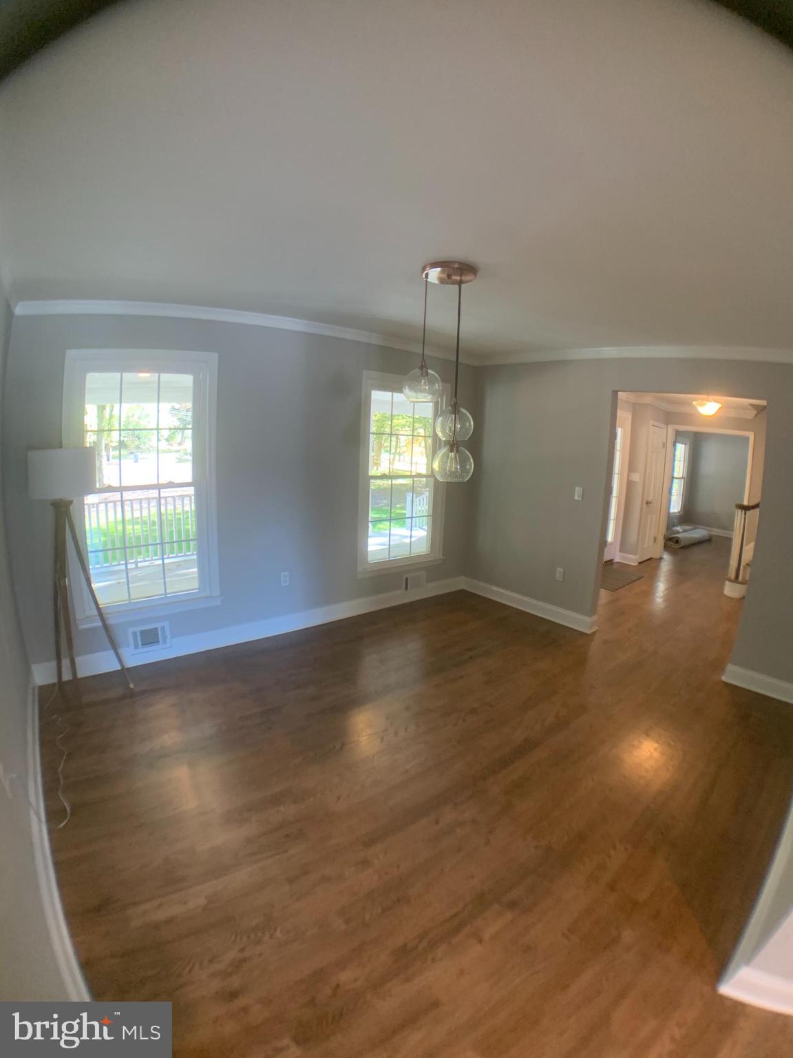 170 Old Georgetown Road Princeton, NJ 08540 - Photo 4 of 14 an empty room with wooden floor and windows