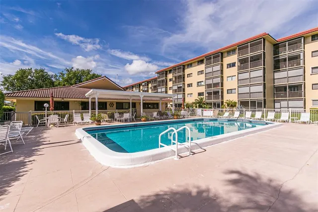 a front view of building with yard