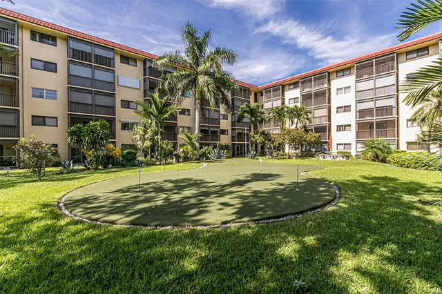a view of a street with cars