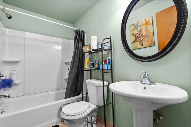 a view of kitchen filled with furniture and wooden floor