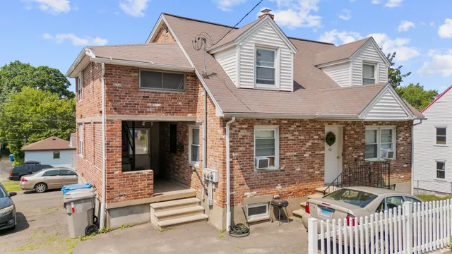 a front view of a house with balcony