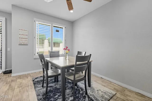 a spacious bedroom with a bed and a cabinets