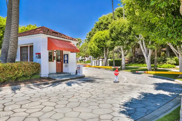 a view of a house with basketball court