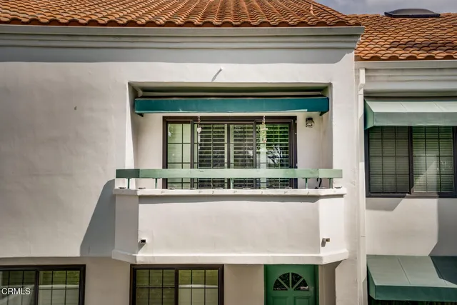 a view of a garden with a pathway