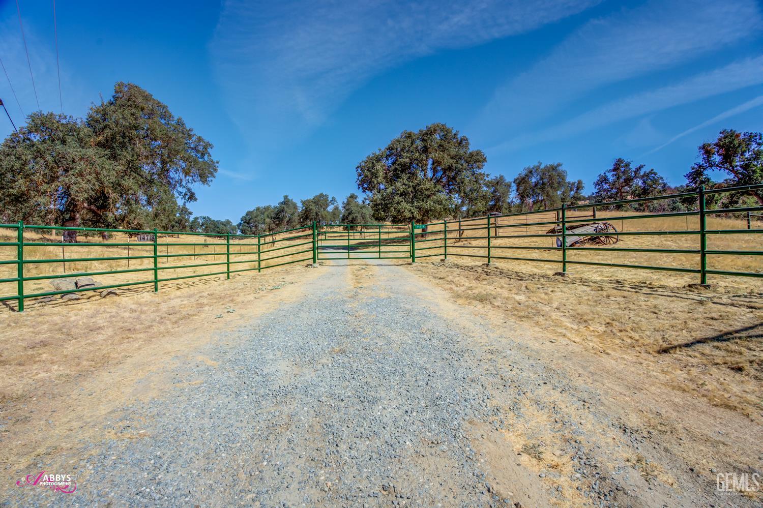 Undisclosed Address Woody, CA 93287 - Photo 17 of 30 a view of a yard with wooden fence