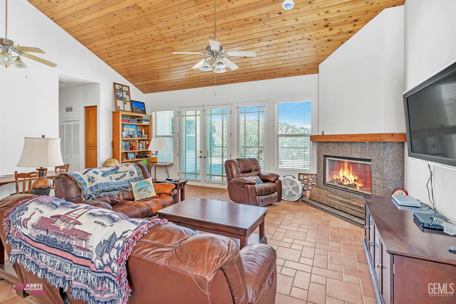 Undisclosed Address Woody, CA 93287 - Photo 5 of 30 a living room with furniture a large window and a fireplace