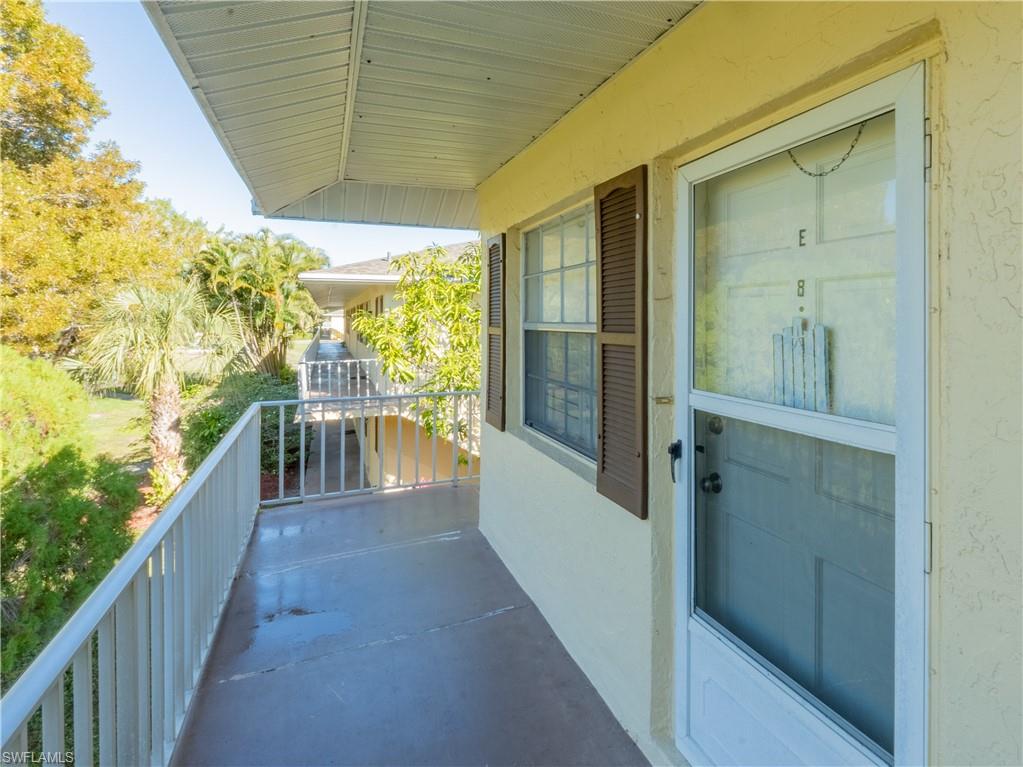 3325 Airport Road North, Unit E8 Naples, FL 34105 - Photo 2 of 7 a view of a balcony