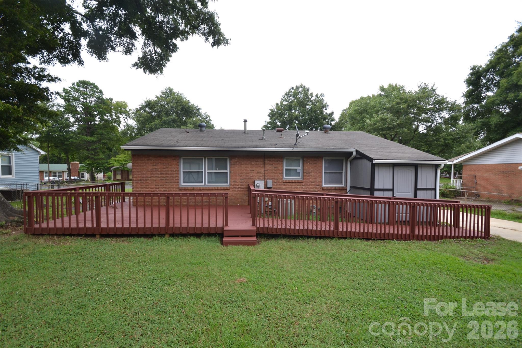 832 Tilden Road Charlotte, NC 28214 - Photo 2 of 13 a view of a house with a yard and sitting area