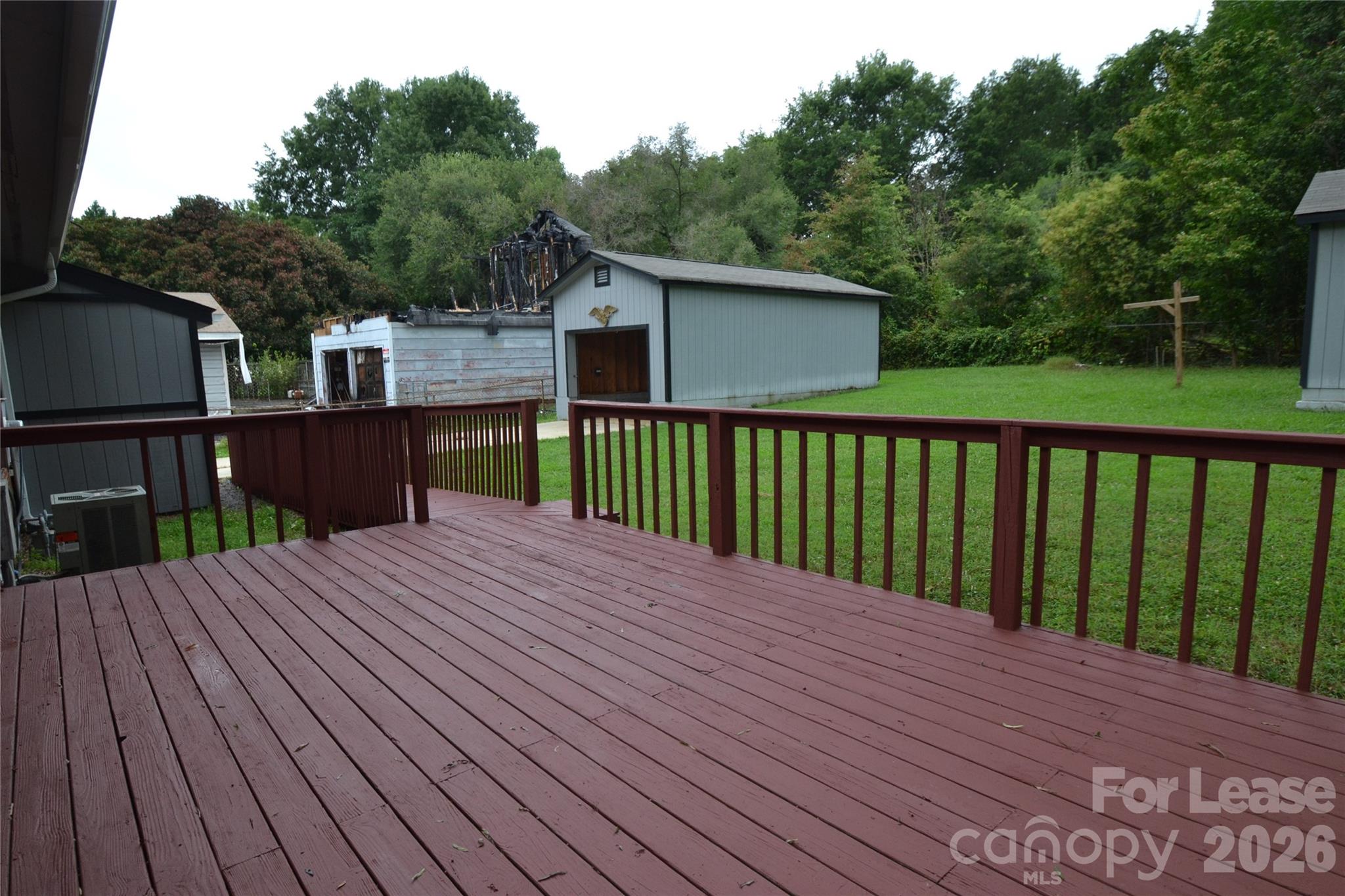832 Tilden Road Charlotte, NC 28214 - Photo 3 of 13 a view of a wooden deck