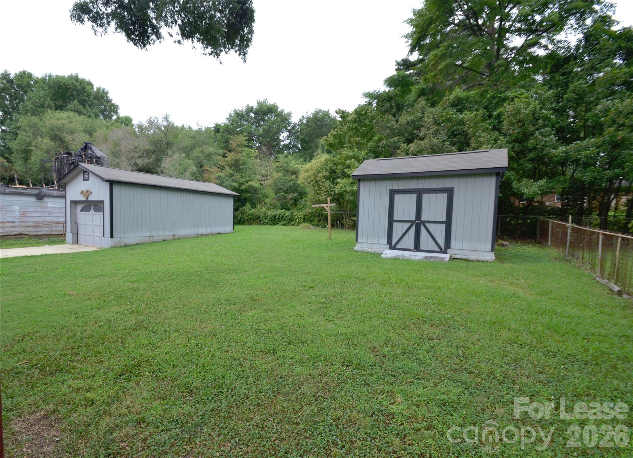 832 Tilden Road Charlotte, NC 28214 - Photo 5 of 13 a view of a house with backyard and garden