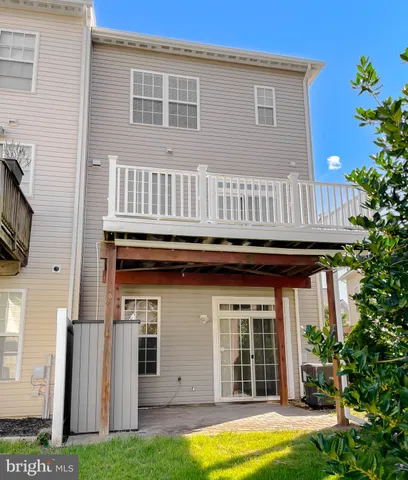 a house with garden in front of it