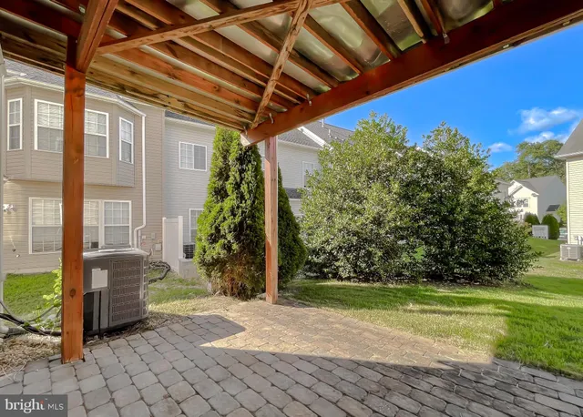a view of an empty room with stairs