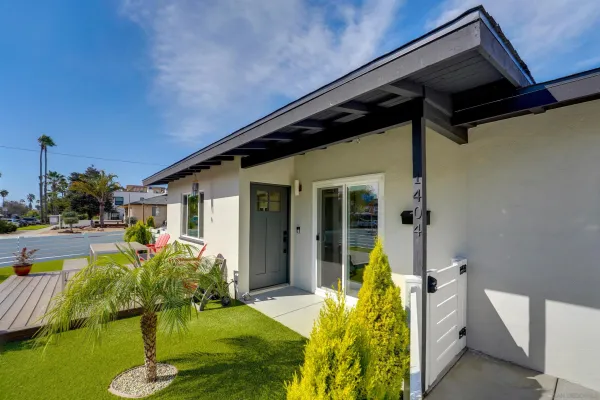 a house view with a seating space and garden view