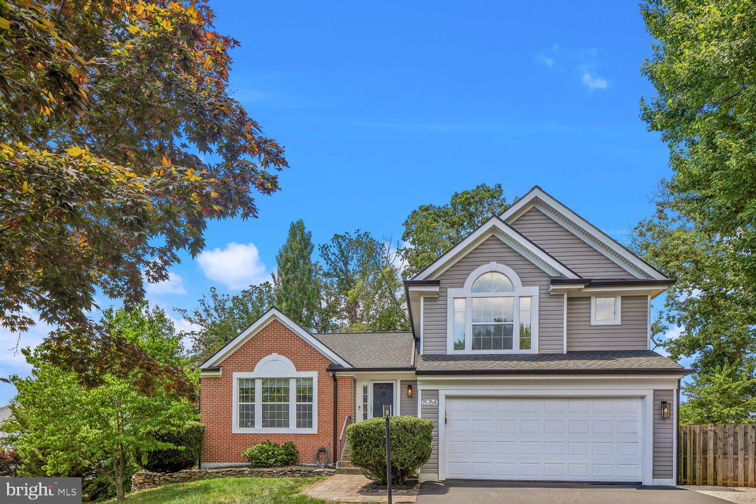 15764 Beau Ridge Drive Woodbridge, VA 22193 - Photo 53 of 58 a front view of a house with garden