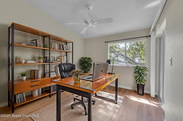 a workspace with furniture and a window