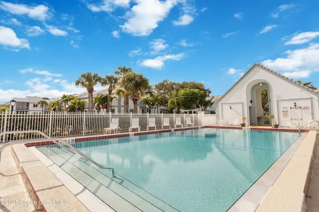 a view of a house with a swimming pool