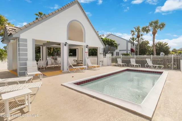 a view of a chairs and table on wooden floor