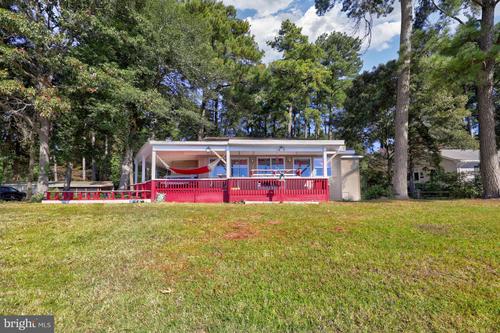 27315 Cottage Road, Unit 19932 Millsboro, DE 19966 - Photo 34 of 77 Exterior Bay Front