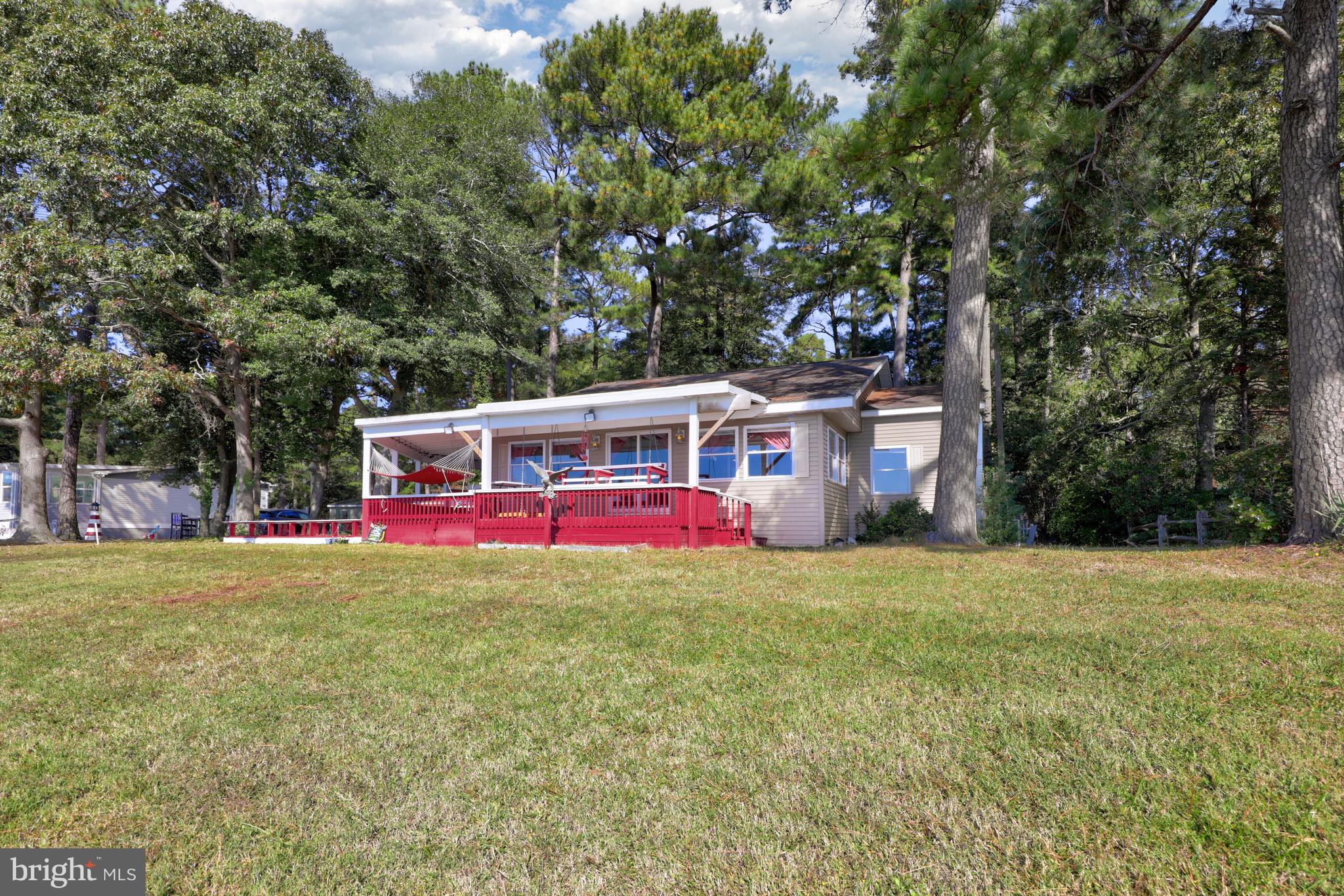 27315 Cottage Road, Unit 19932 Millsboro, DE 19966 - Photo 35 of 77 Exterior Bay Front