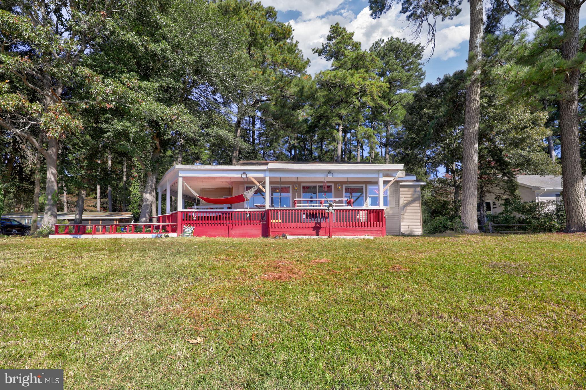 27315 Cottage Road, Unit 19932 Millsboro, DE 19966 - Photo 65 of 77 Exterior Bay Front