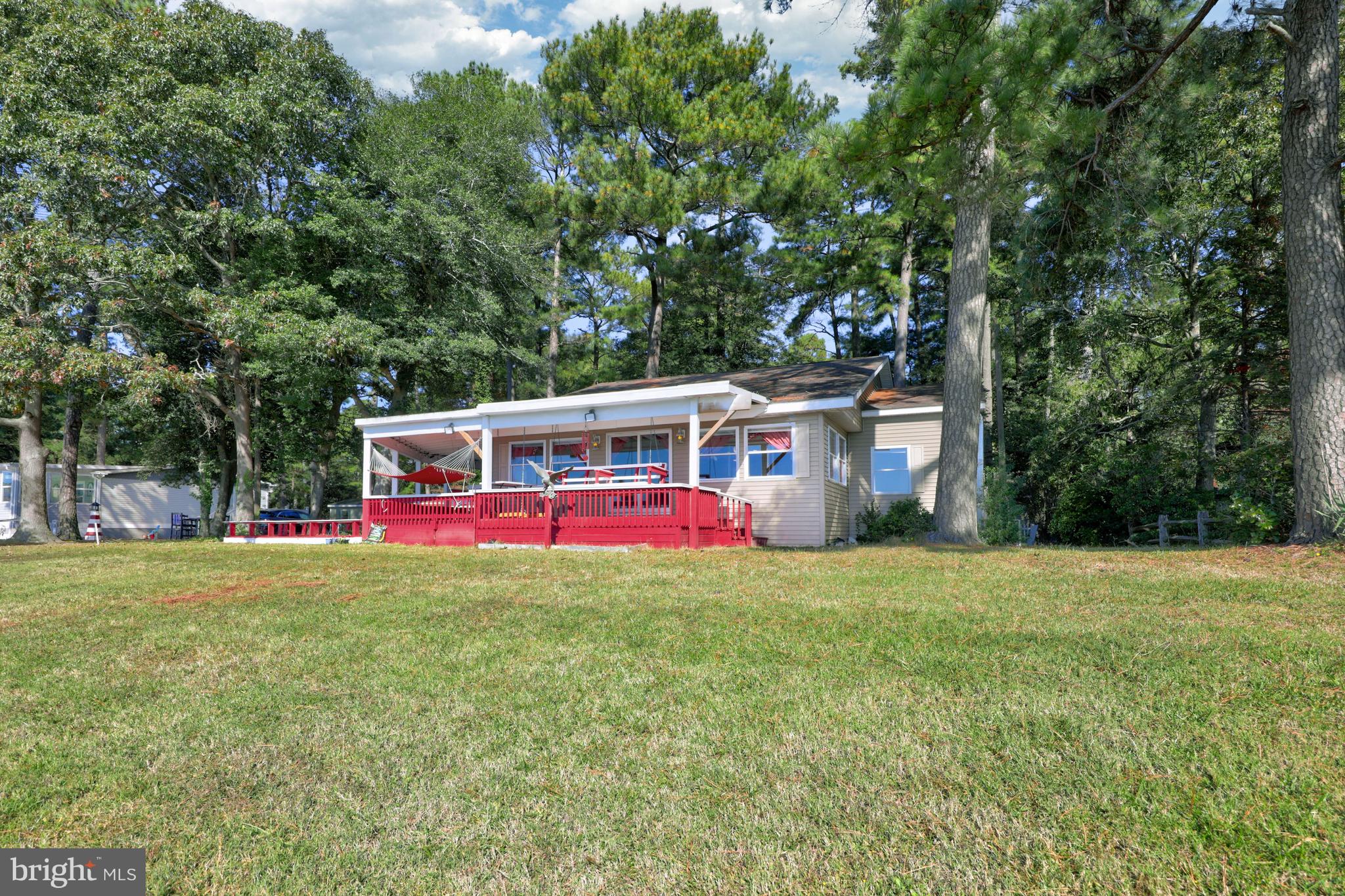 27315 Cottage Road, Unit 19932 Millsboro, DE 19966 - Photo 66 of 77 Exterior Bay Front