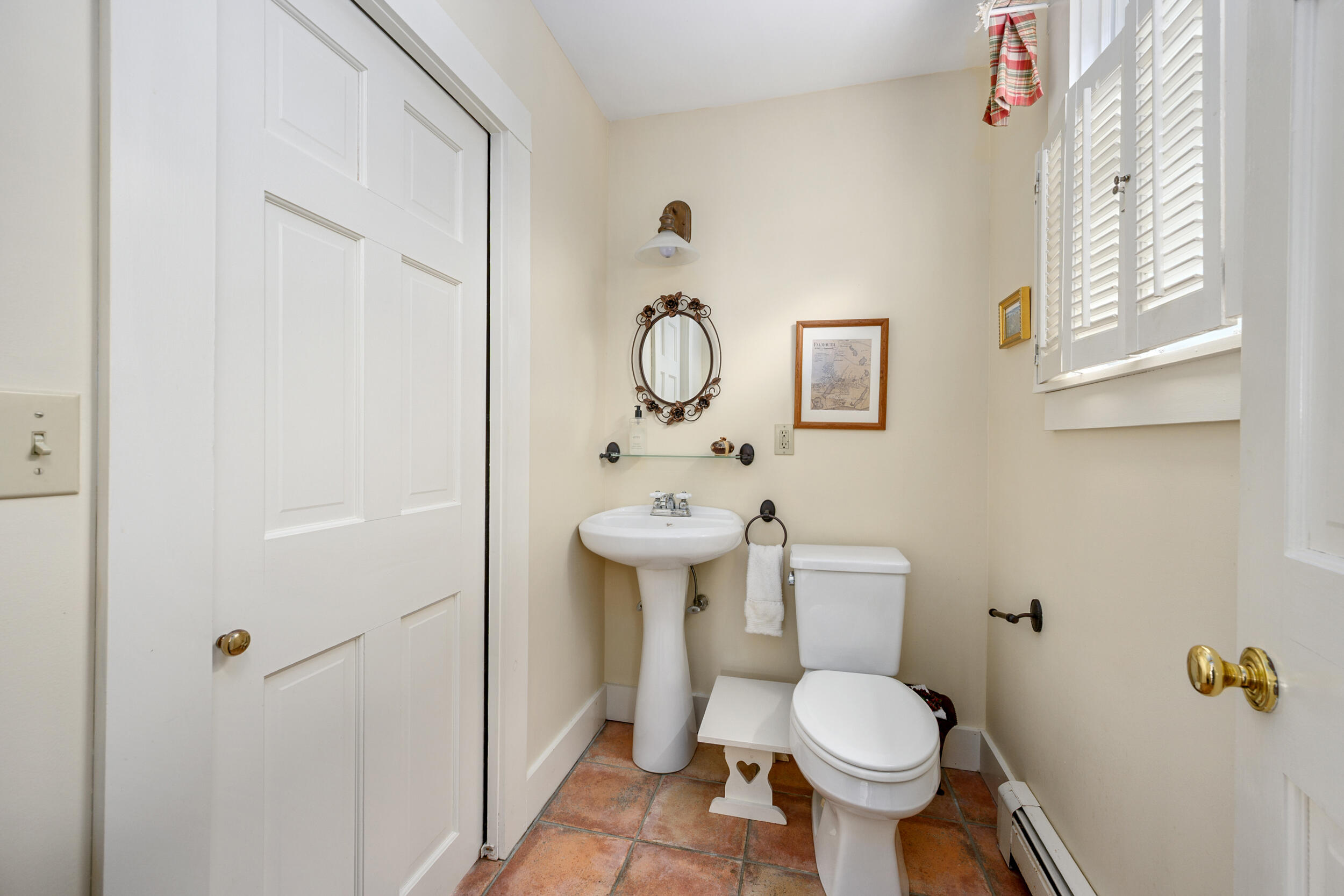 332 South Orleans Road Orleans, MA 02653 - Photo 16 of 42 a white toilet sitting next to a bathroom sink