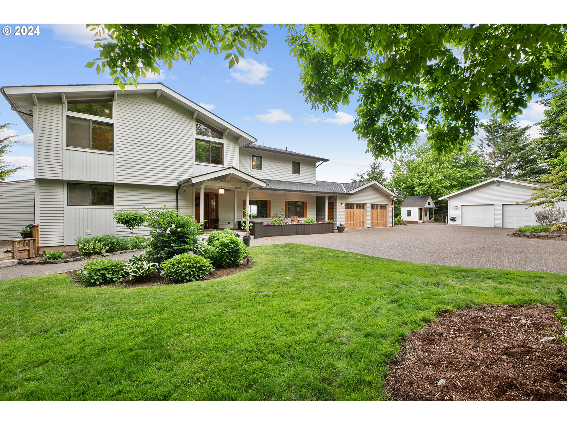 28900 Southwest Heater Road Sherwood, OR 97140 - Photo 1 of 48 a view of a yard in front of house