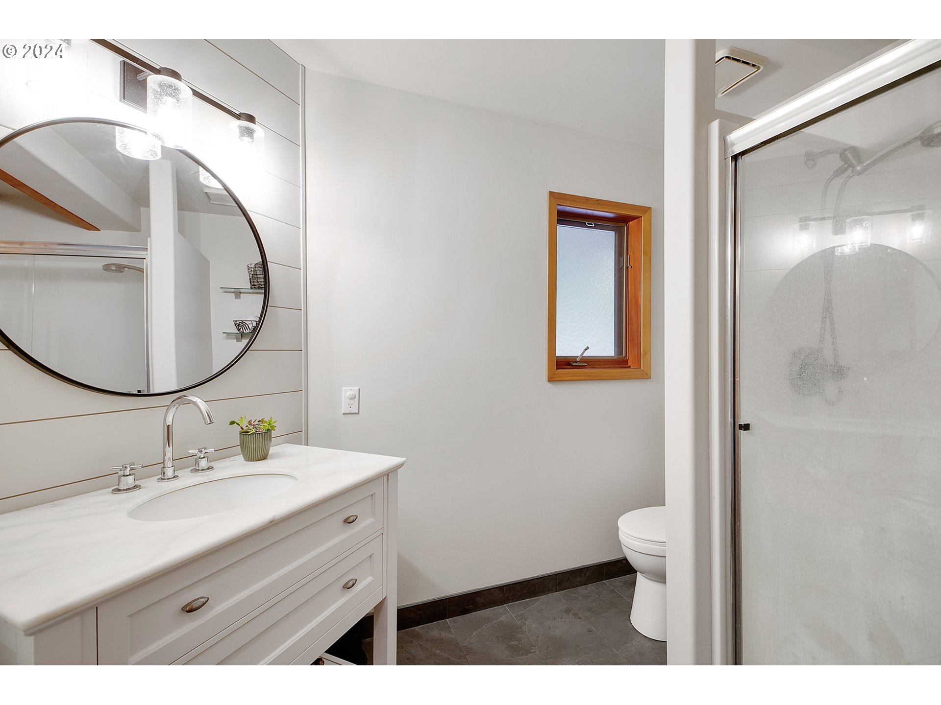 28900 Southwest Heater Road Sherwood, OR 97140 - Photo 20 of 48 a bathroom with a sink mirror and toilet
