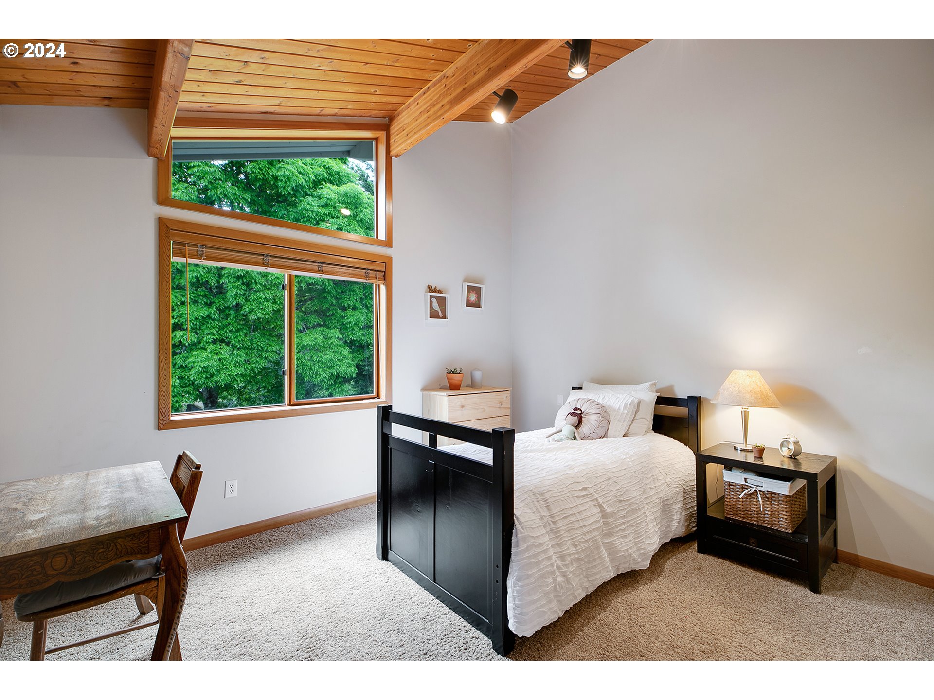 28900 Southwest Heater Road Sherwood, OR 97140 - Photo 28 of 48 a bedroom with furniture and a window