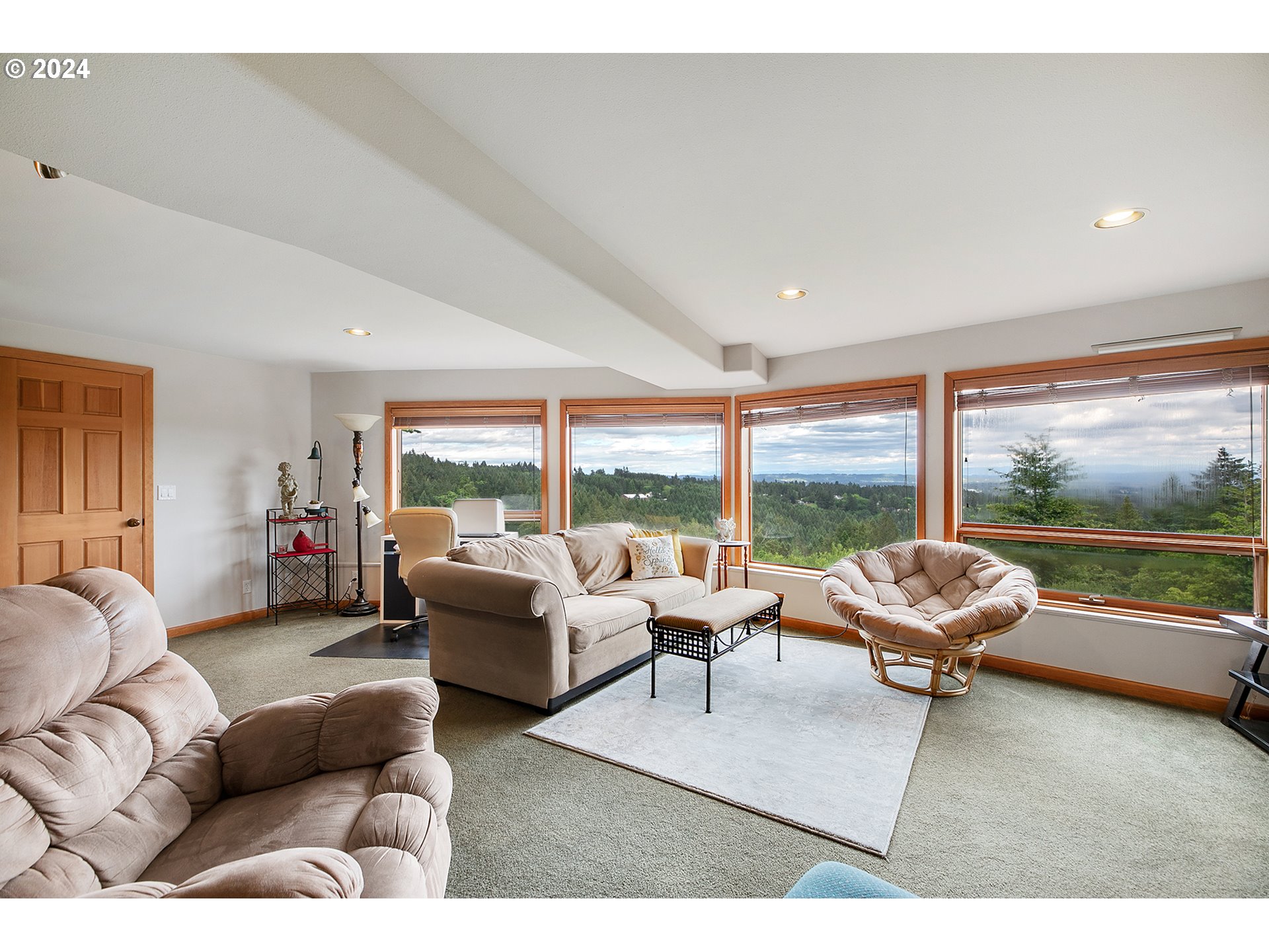 28900 Southwest Heater Road Sherwood, OR 97140 - Photo 32 of 48 a living room with furniture and a large window