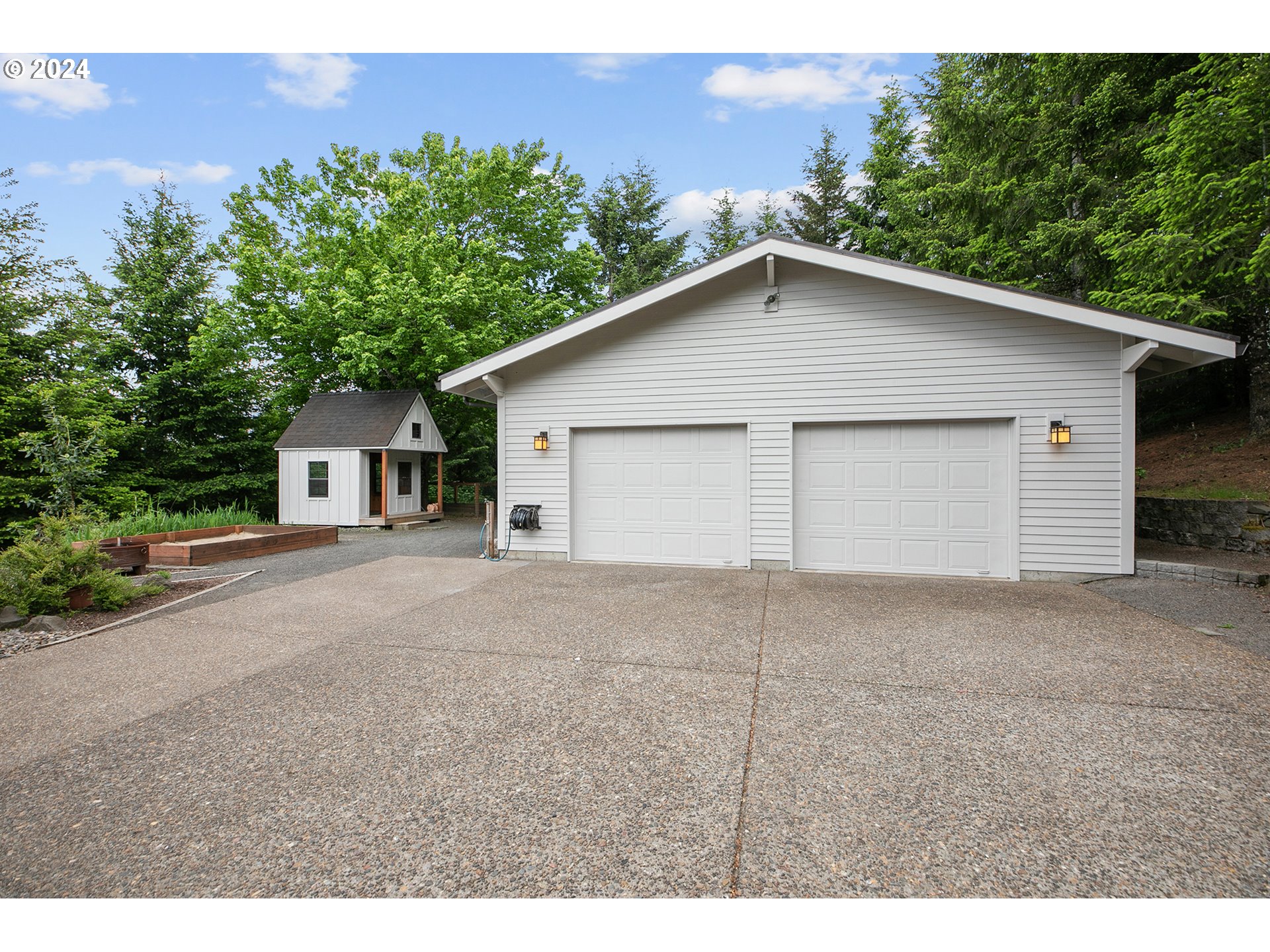 28900 Southwest Heater Road Sherwood, OR 97140 - Photo 36 of 48 a view of a house with a yard and garage