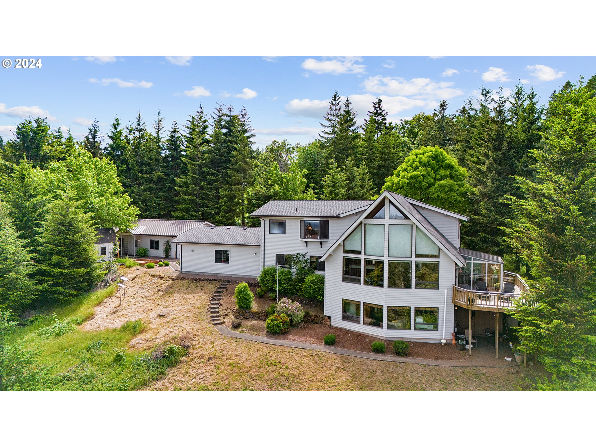 28900 Southwest Heater Road Sherwood, OR 97140 - Photo 41 of 48 a aerial view of a house with a yard and a large pool