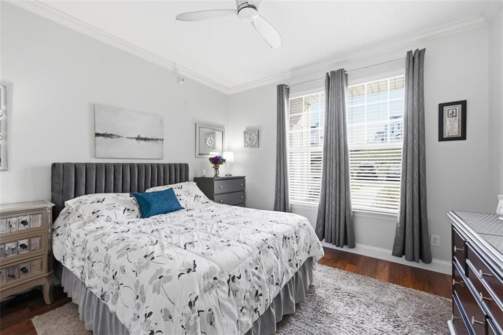 217 Adams Pointe Boulevard, Unit 11 Mars, PA 16046 - Photo 12 of 27 a bedroom with a bed and a window