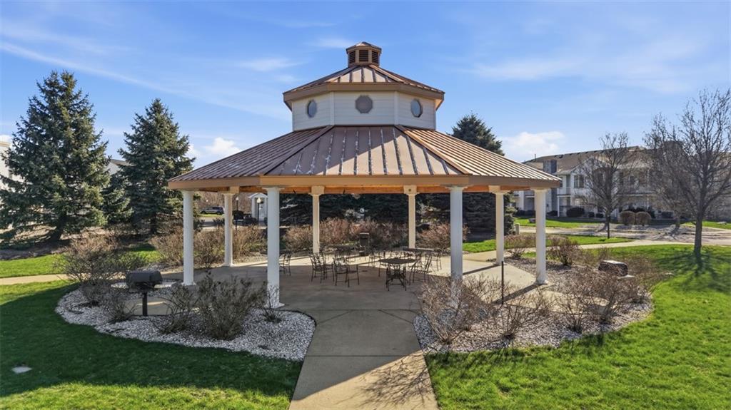 217 Adams Pointe Boulevard, Unit 11 Mars, PA 16046 - Photo 23 of 27 a front view of a house with garden