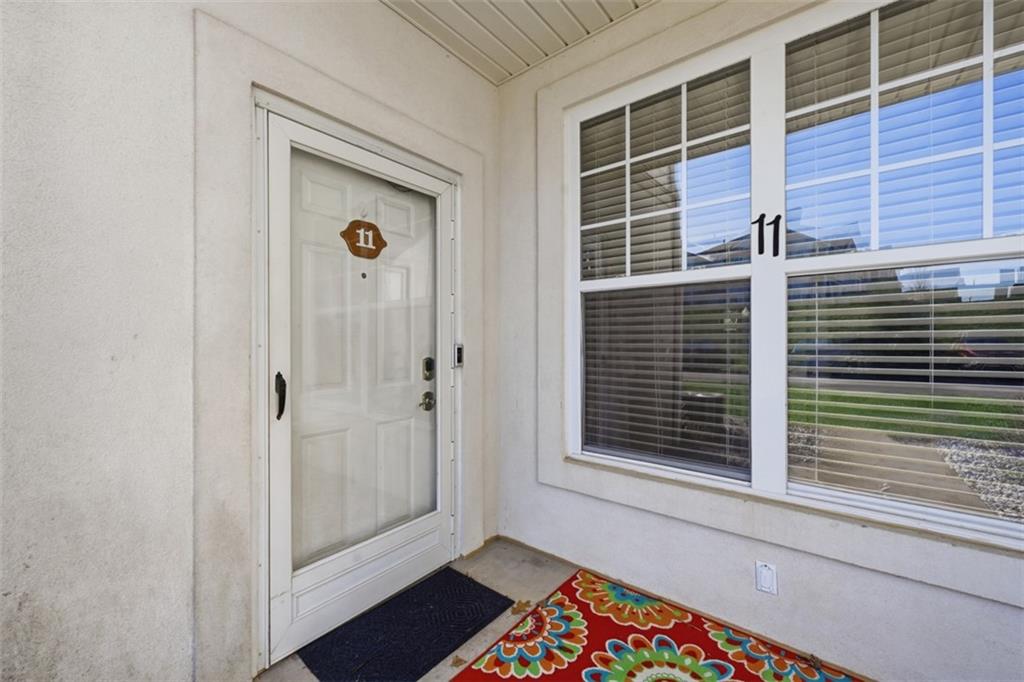 217 Adams Pointe Boulevard, Unit 11 Mars, PA 16046 - Photo 3 of 27 a view of front door of house
