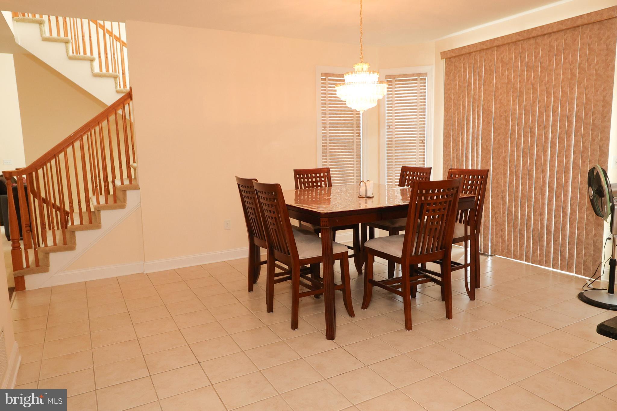 2 Edgewood Drive Pittsgrove, NJ 08318 - Photo 17 of 78 a view of a dining room with furniture and chandelier