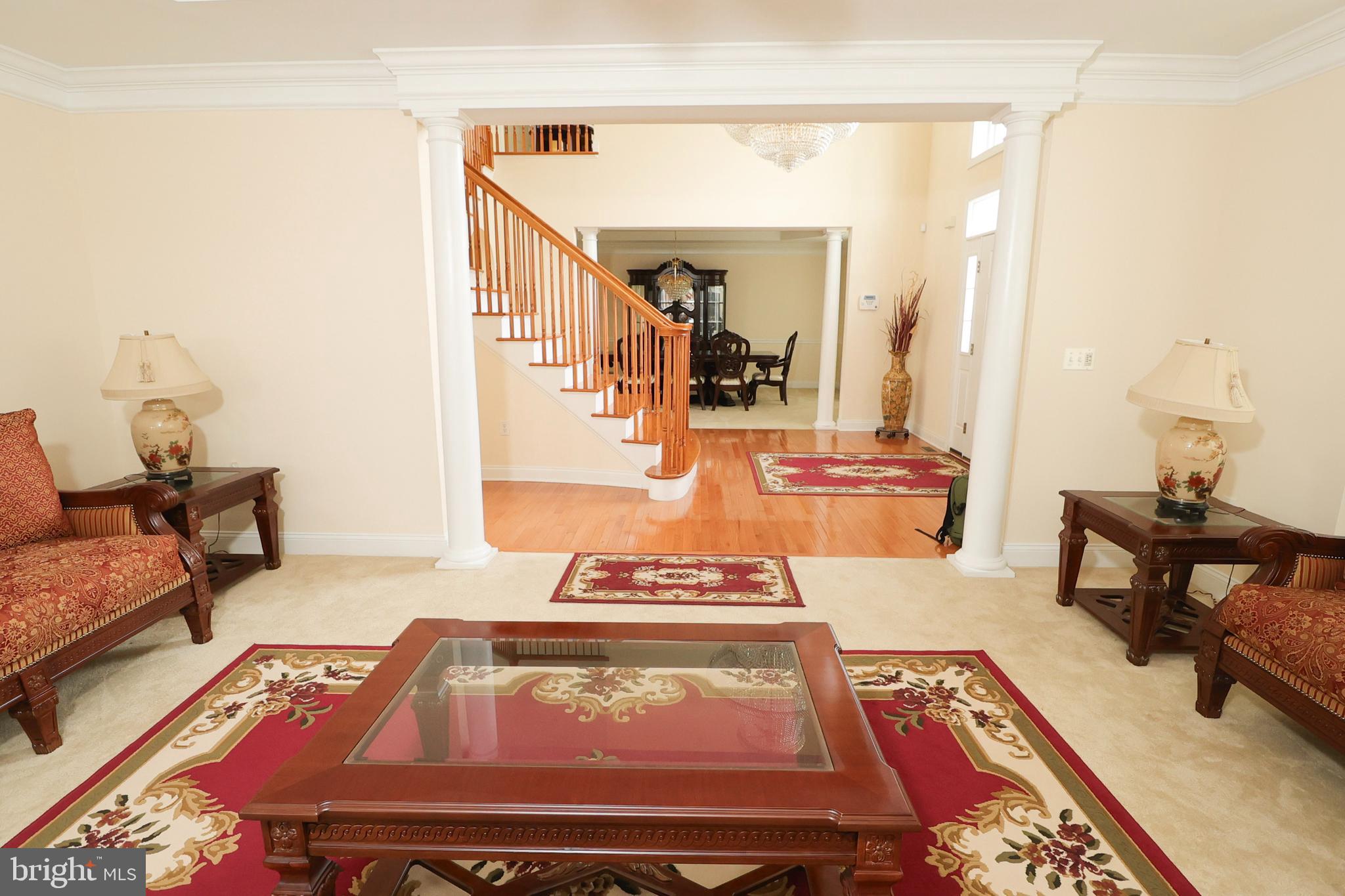 2 Edgewood Drive Pittsgrove, NJ 08318 - Photo 23 of 78 a living room with furniture a rug and a table