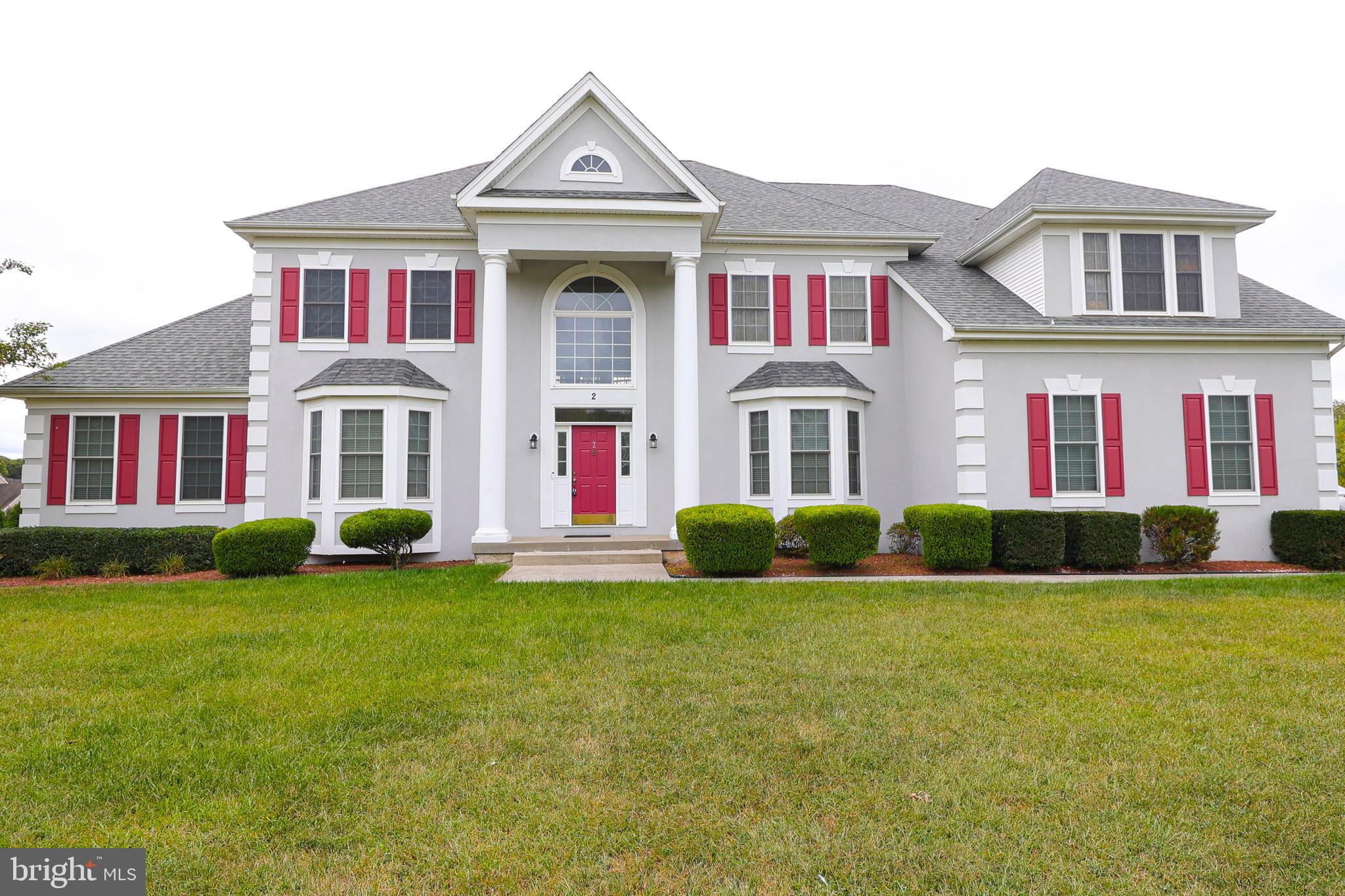 2 Edgewood Drive Pittsgrove, NJ 08318 - Photo 78 of 78 a front view of a house with garden and porch